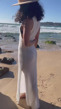 model wearing white wool dress on australian beach