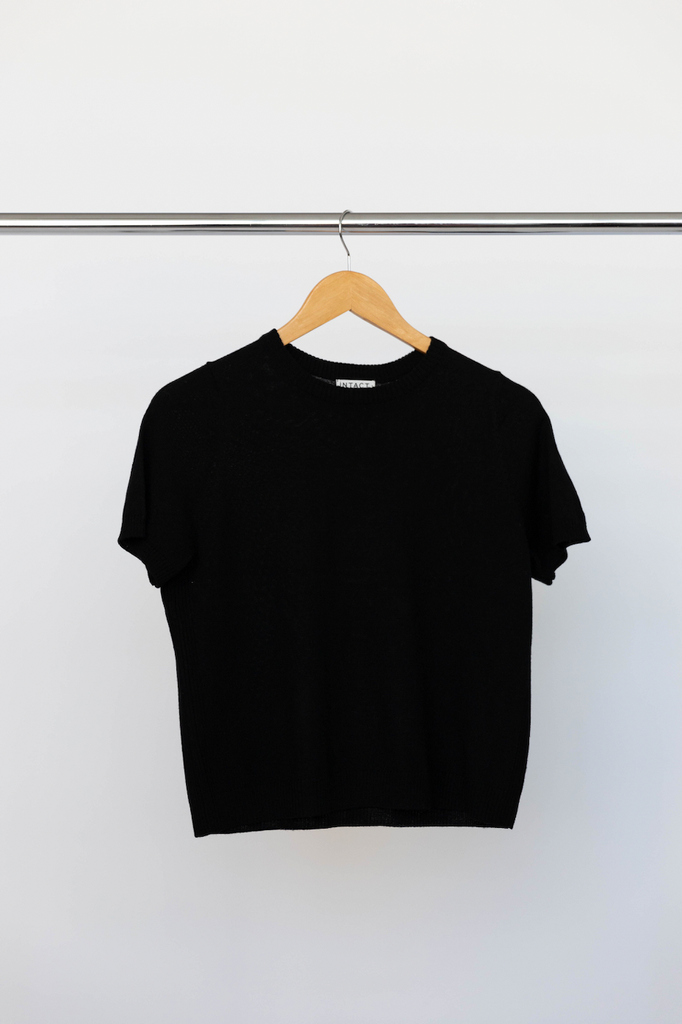 INTACT merino wool uniform tee black on clothes hanger