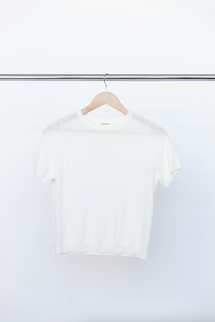 INTACT merino wool uniform tee white on clothes hanger